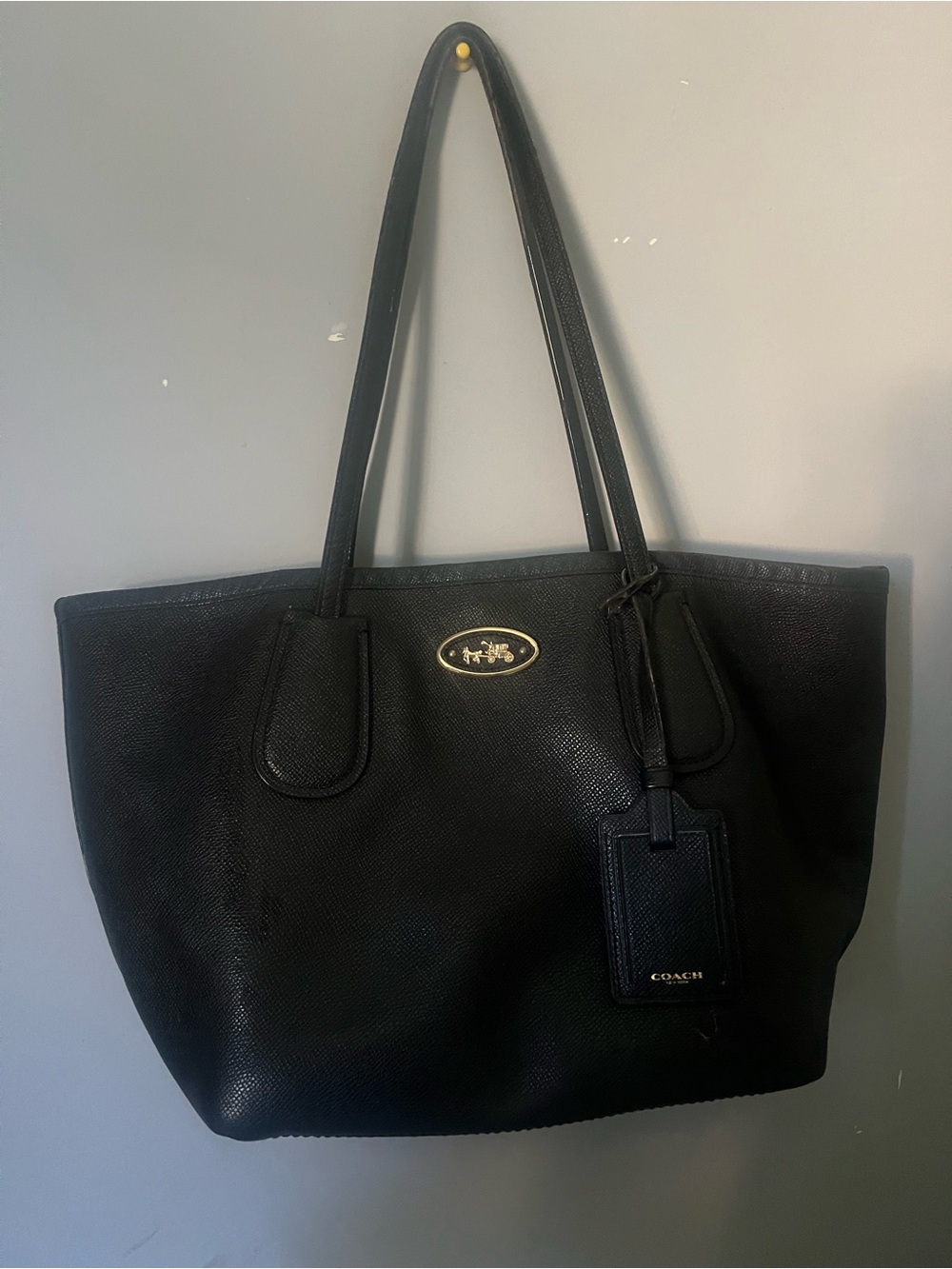 Coach Black Leather Tote with Gold Emblem and Tag